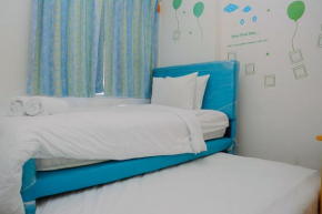 Comfort 1BR with Study Room Menteng Square Apartment By Travelio